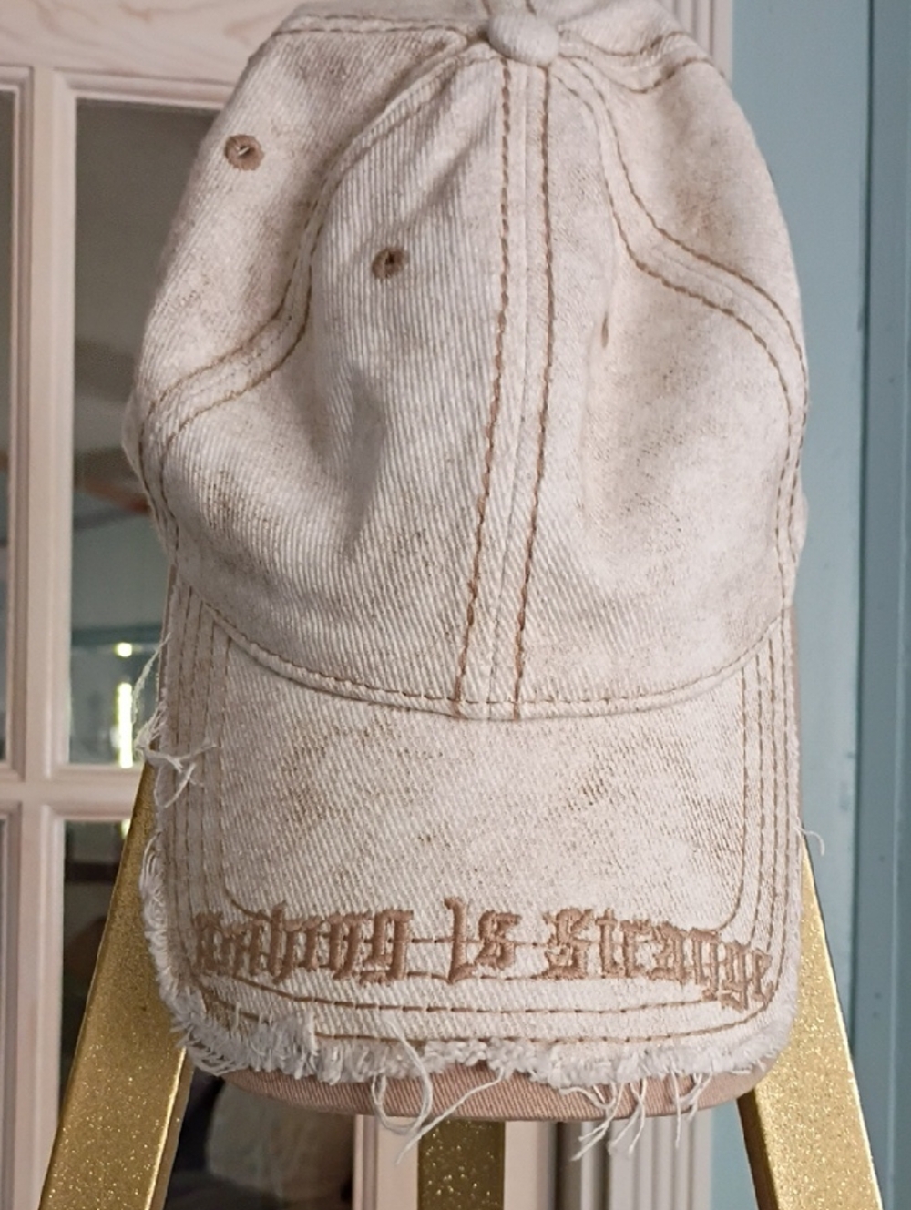 Vintage-Style Cream Distressed Baseball Cap with Embroidered Script
